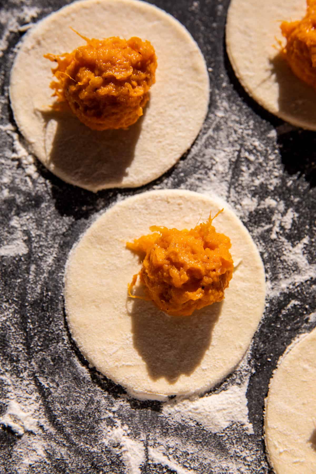 Sweet Potato Cheddar Pierogi with Bacon Bits | halfbakedharvest.com