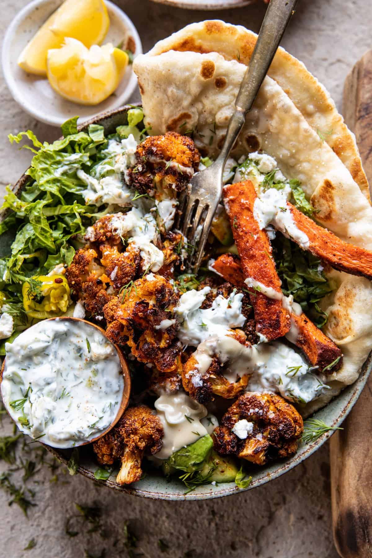 Cauliflower Tzatziki Bowls with Sweet Potato Fries | halfbakedharvest.com