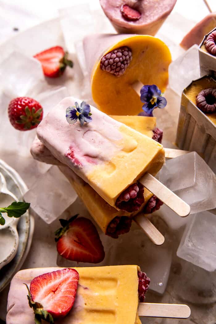 Creamy Strawberry Mango Popsicles | halfbakedharvest.com
