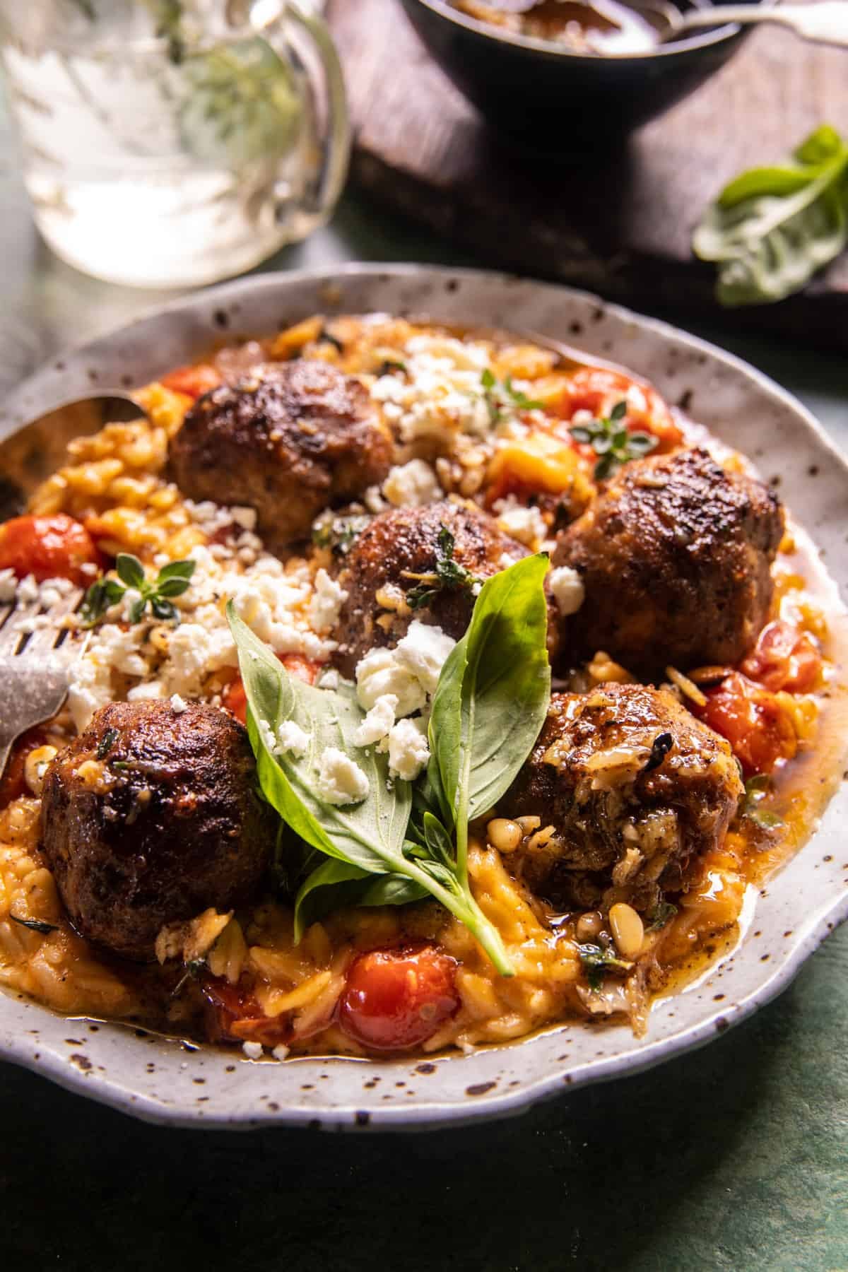 Crockpot Greek Chicken Meatballs with Creamy Tomato Orzo | halfbakedharvest.com