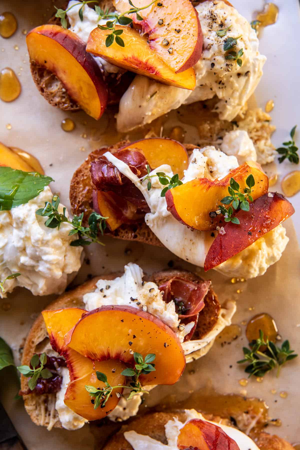 Peach Burrata Parmesan Crostini with Hot Honey | halfbakedharvest.com