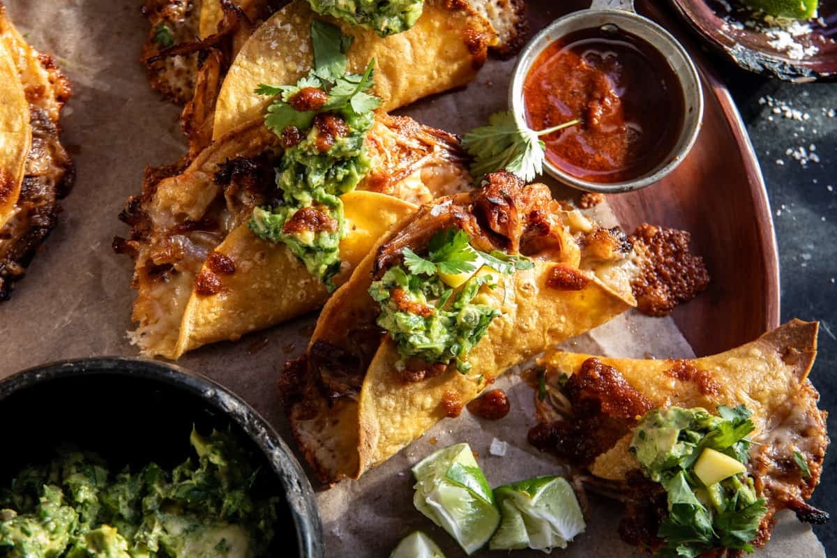 Crispy Carnitas Tacos with Roasted Jalapeño Lime Avocado | halfbakedharvest.com