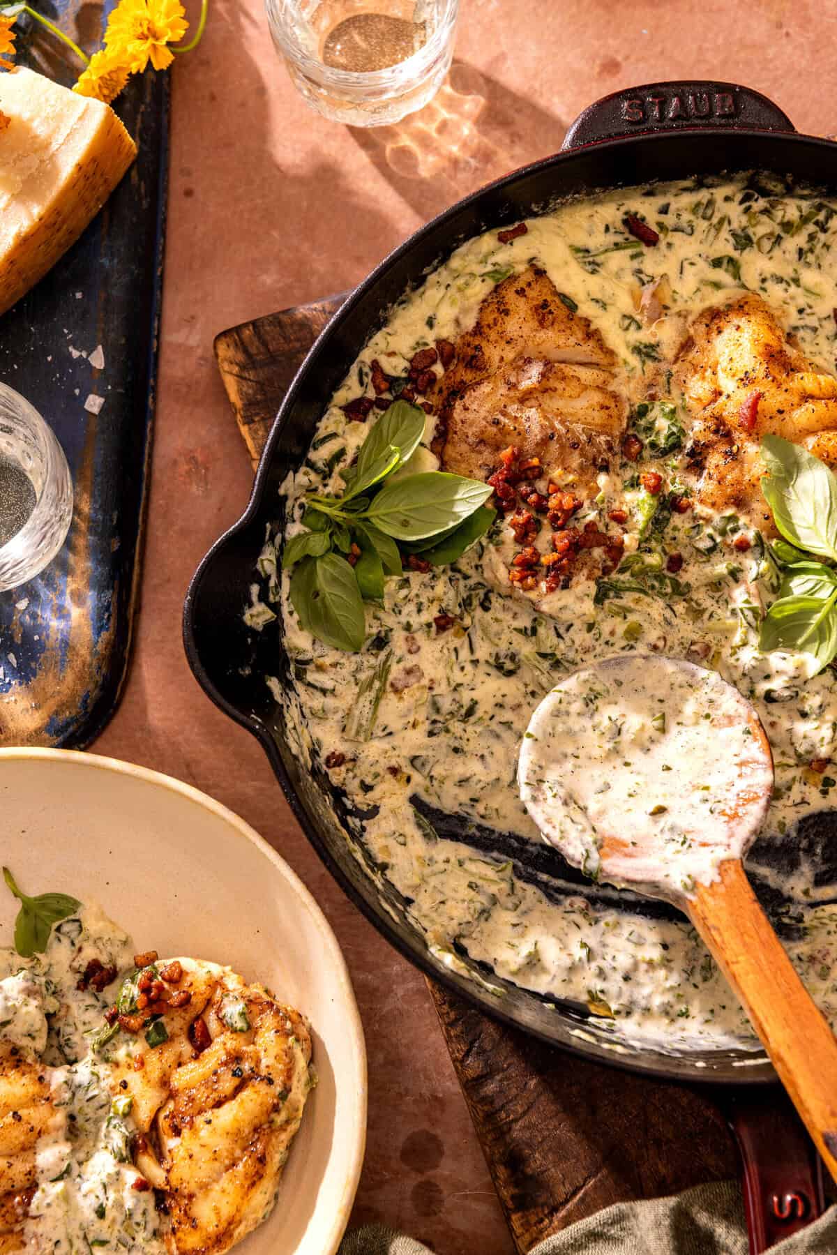 Garlic Butter Cod Florentine with White Wine Cream Sauce | halfbakedharvest.com